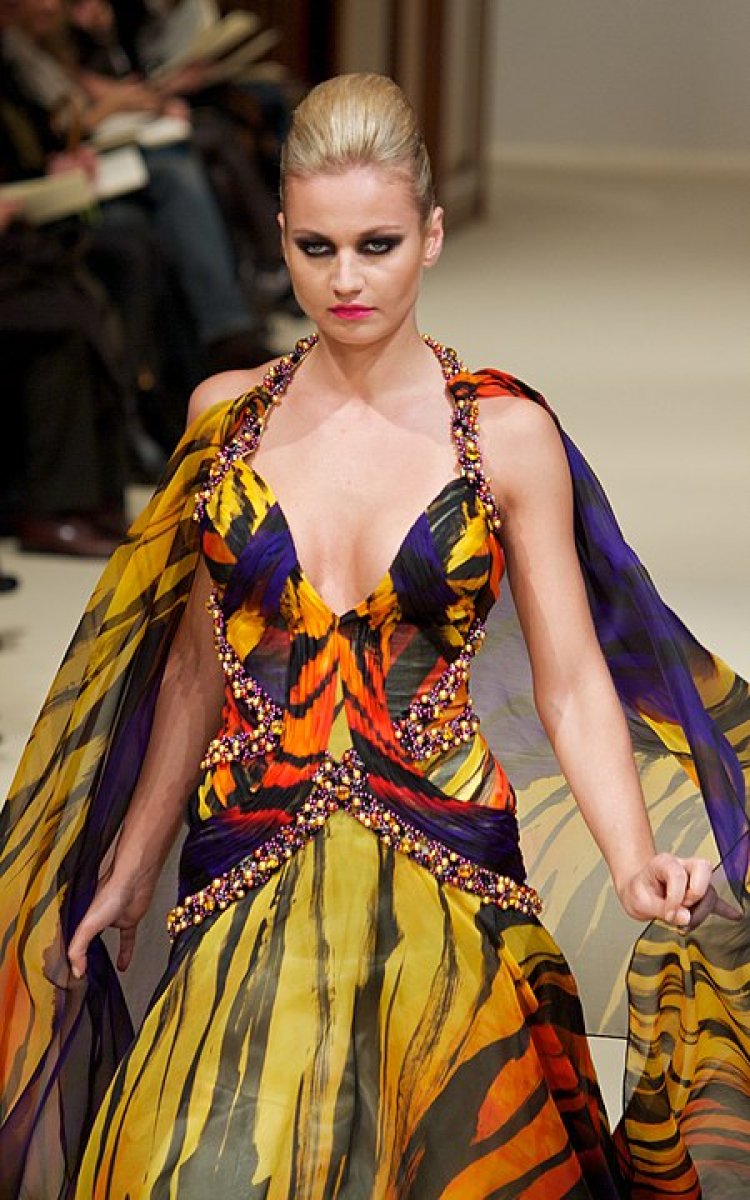 Model in a designer gown at an Haute couture fashion show, Paris, 2011